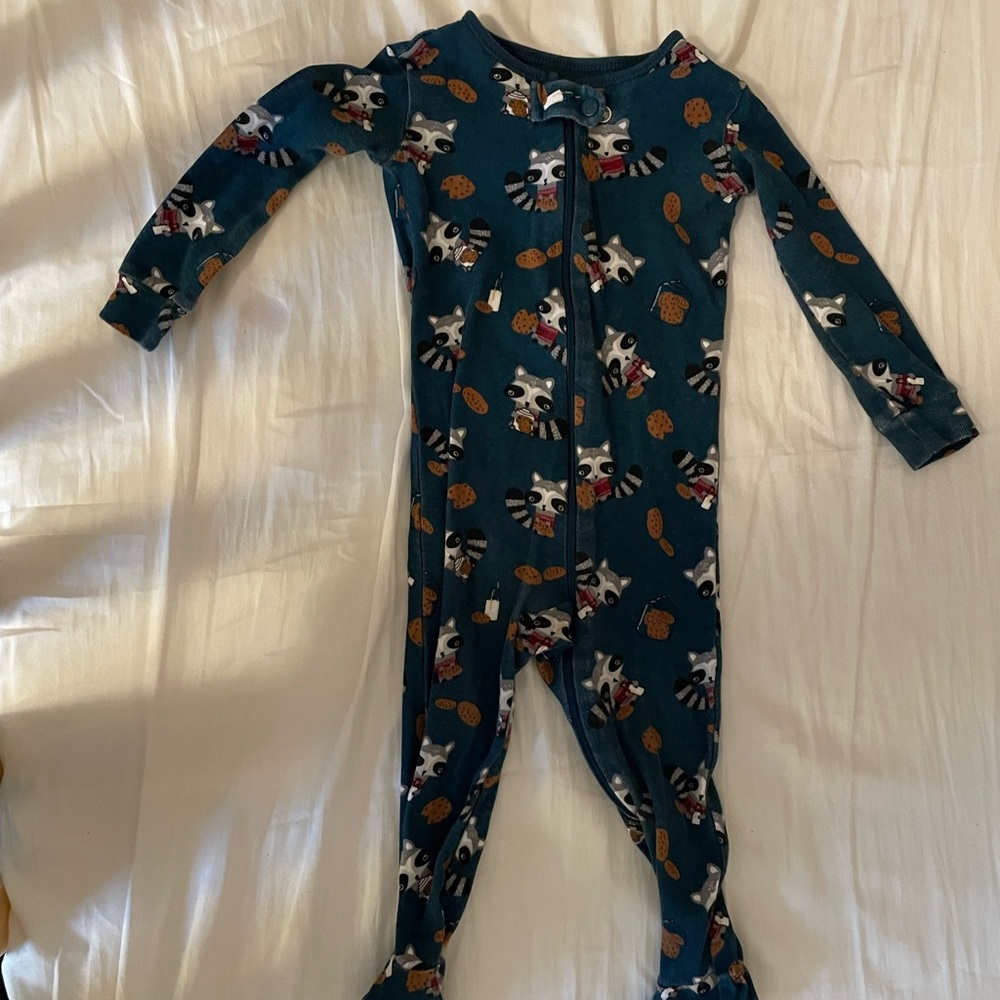 The children’s place footie pajamas: raccoon eating cookies